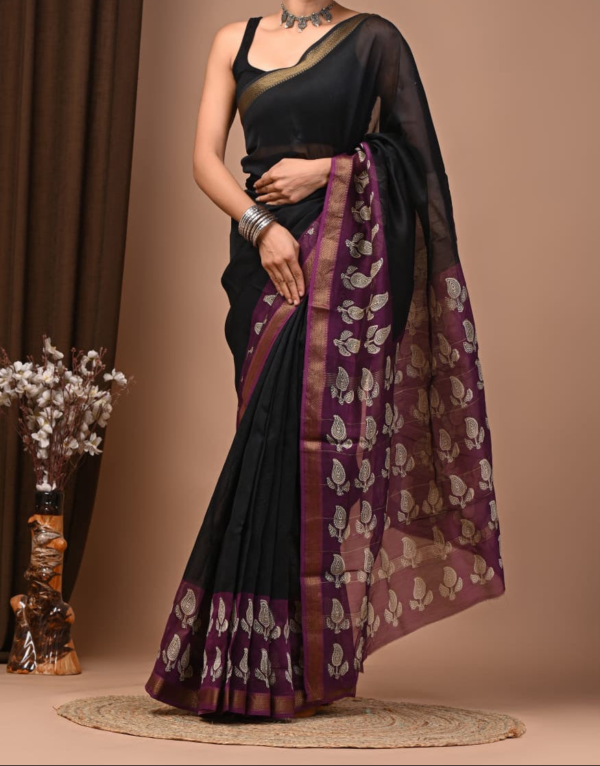 Maheshwari sik sarees Black saree with ourple white motifs pallu and border , purple Zari border