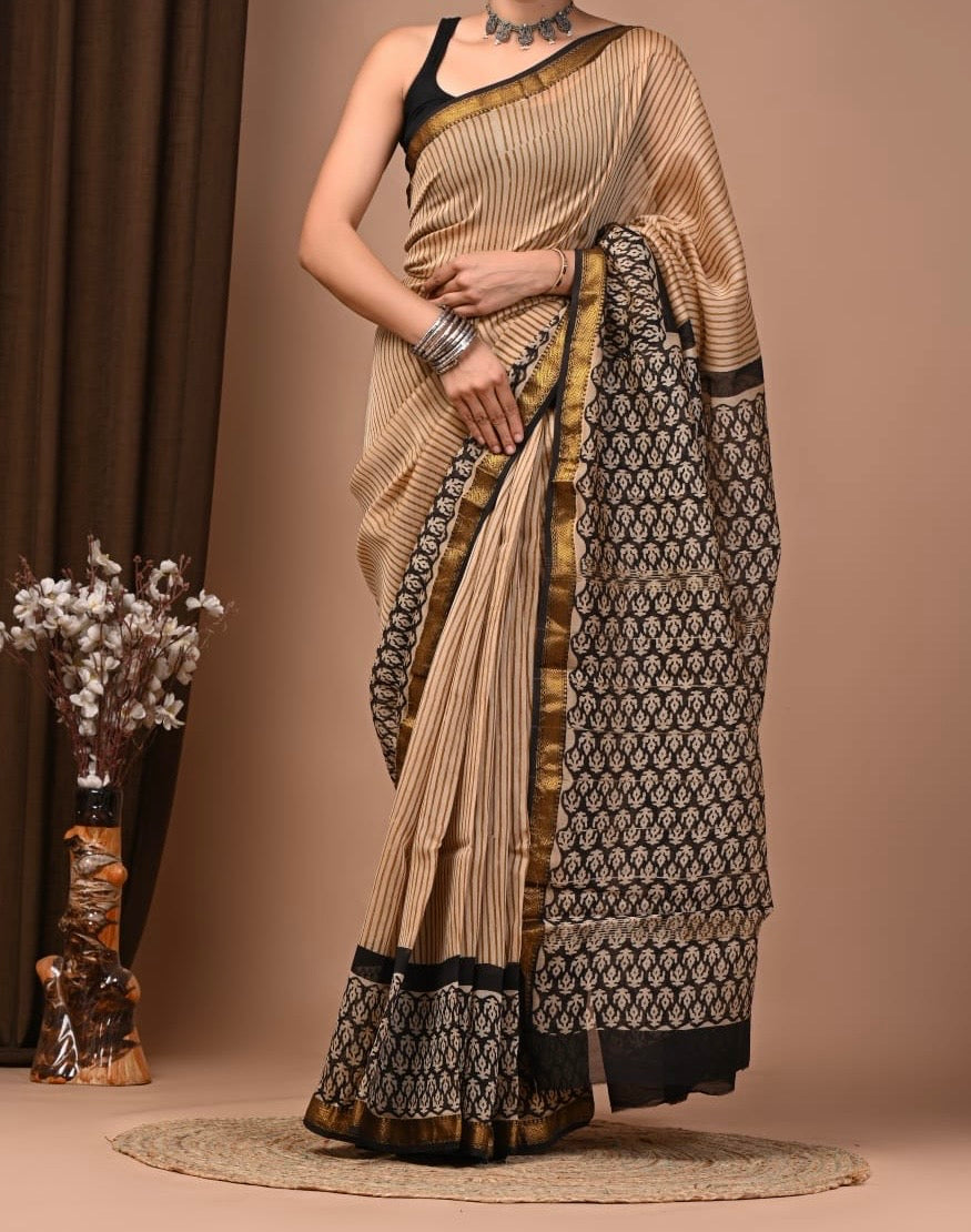 Maheshwari sik sarees Biege Saree with Black stripe Motifs throughout body, black floral geometrical motifs pallu and border