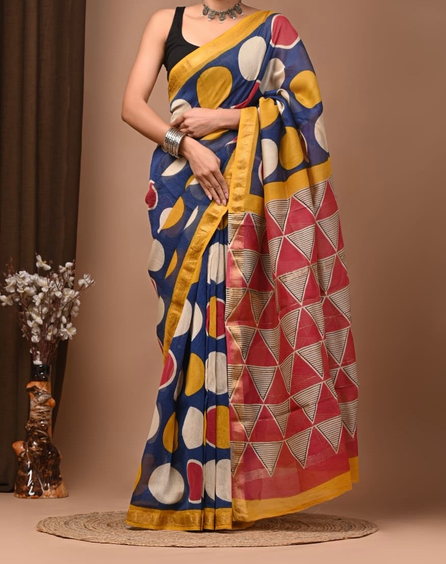 Maheshwari sik sarees Blue saree with yellow red and white polka dots throughout the body, red and beige trainge geometric border , sleek yellow zari border