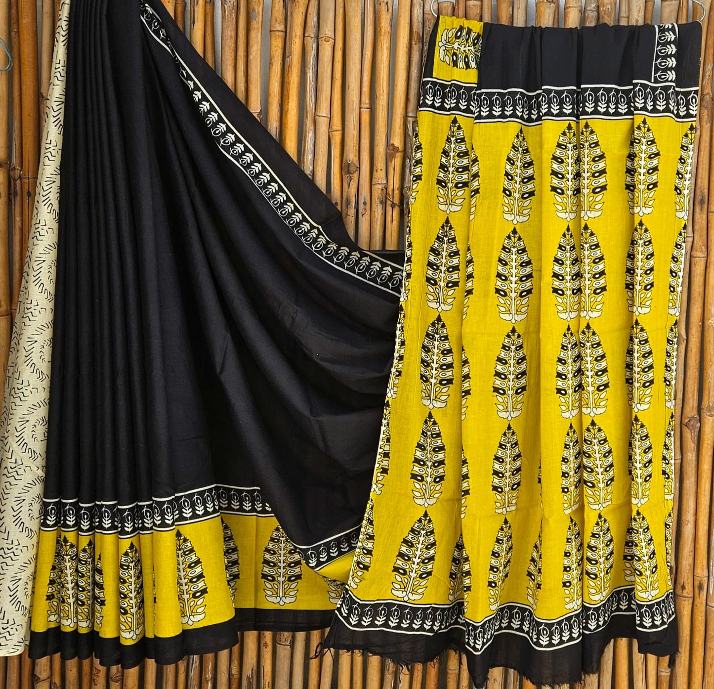 Cotton Mulmul Saree black Saree with Yellow floral Motifs, Black and Yellow pallu Black stripes motifs, Floral motifs
