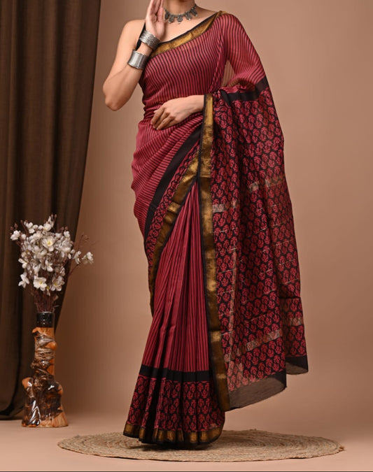 Maheshwari sik sarees Red saree with black motifs throughout the body, black and red geometric motifs pallu and border.