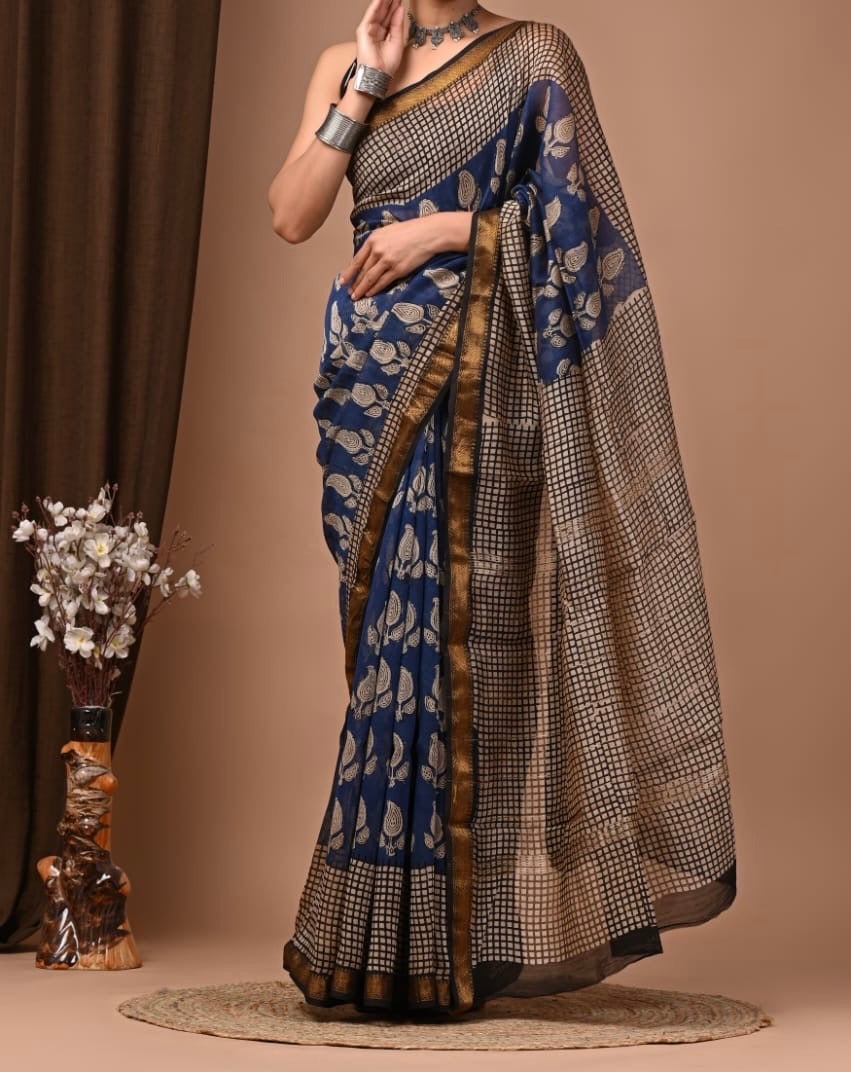 Maheshwari sik sarees Indigo saree with beige floral motifs, beige floral motifs pallu, sleek zari border.