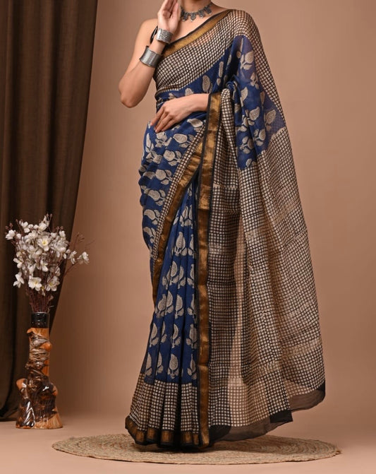 Maheshwari sik saris Indigo sari with beige floral motifs, beige floral motifs pallu, sleek zari border.